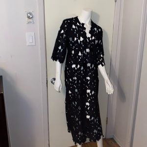 Brand new dress never worn, beautiful, loose, fit, see-through lace